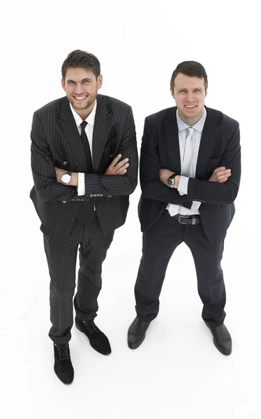 Σε πλήρη growth.two σοβαρή επιχειρηματικούς εταίρους στέκεται, απομονώνονται σε λευκό φόντο. — Φωτογραφία Αρχείου