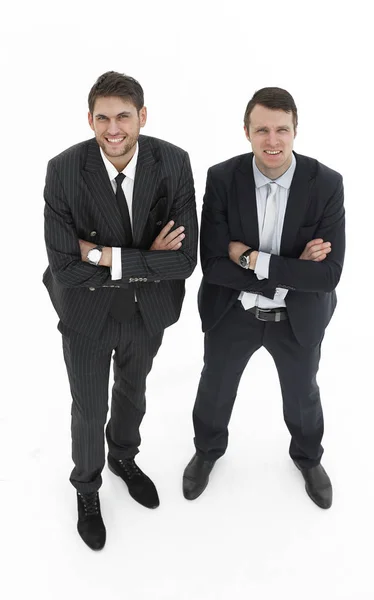 En pleno crecimiento.dos socios comerciales serios de pie, aislados sobre fondo blanco . — Foto de Stock