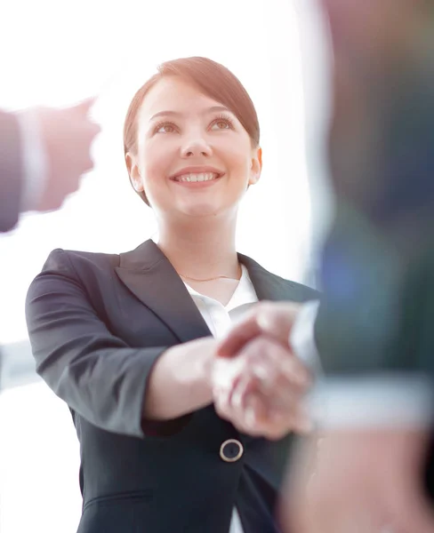 Closeup of business woman shaking hands with her business partner. — Stock Photo, Image