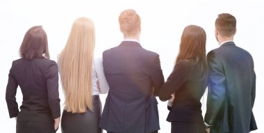 arka görüş. Beyaz bir ekrana bakarak iş takım