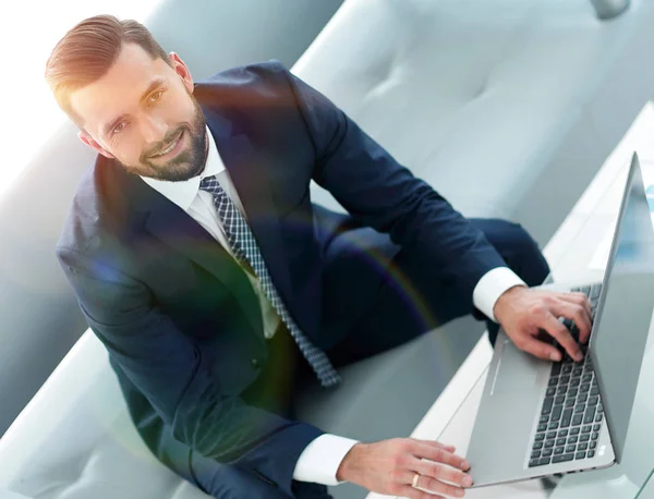 Top view of businessman working on laptop in office — Stock Photo, Image