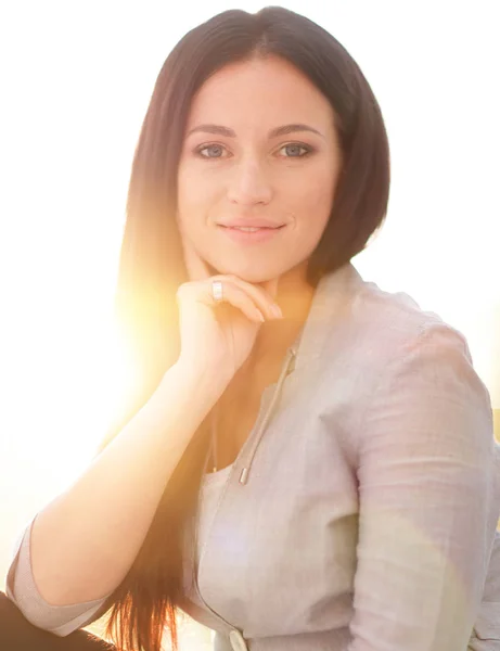 Close-up. modern young woman sitting on the floor. — Stock Photo, Image