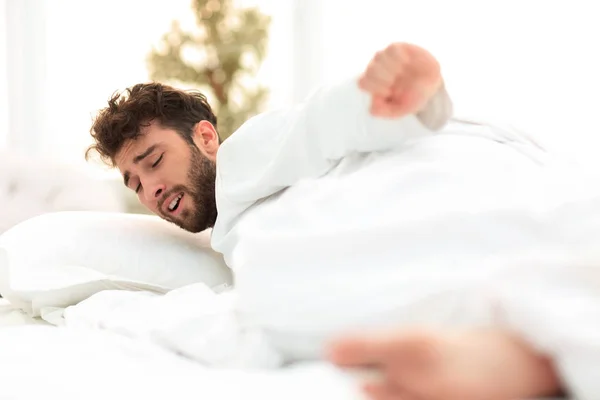 Closeup.tired men asleep on the bed — Stock Photo, Image