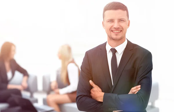 Successful businessman on blurred background office — Stock Photo, Image