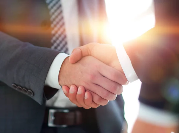 Businessman giving his hand for handshake to partner — Stock Photo, Image