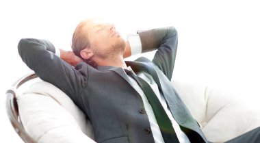 genç işadamı büyük rahat koltukta, meditasyon