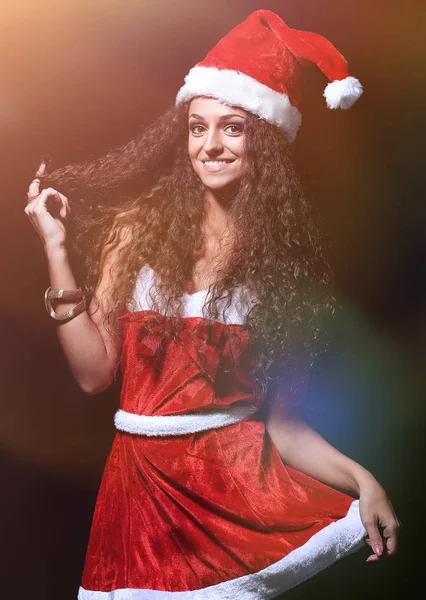 Schöne Frau im Weihnachtsmann-Kostüm — Stockfoto