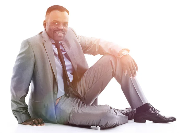 Афро-американский бизнесмен расслабляется — стоковое фото