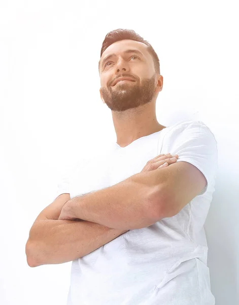 Happy young man resting on a white screen — Stock Photo, Image