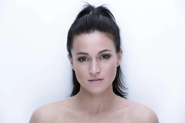 Close-up portrait of a young womans face. — Stock Photo, Image