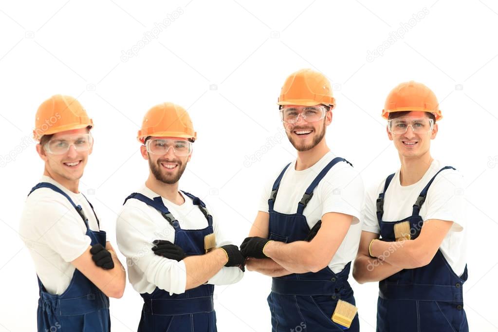 smiling team of construction workers .