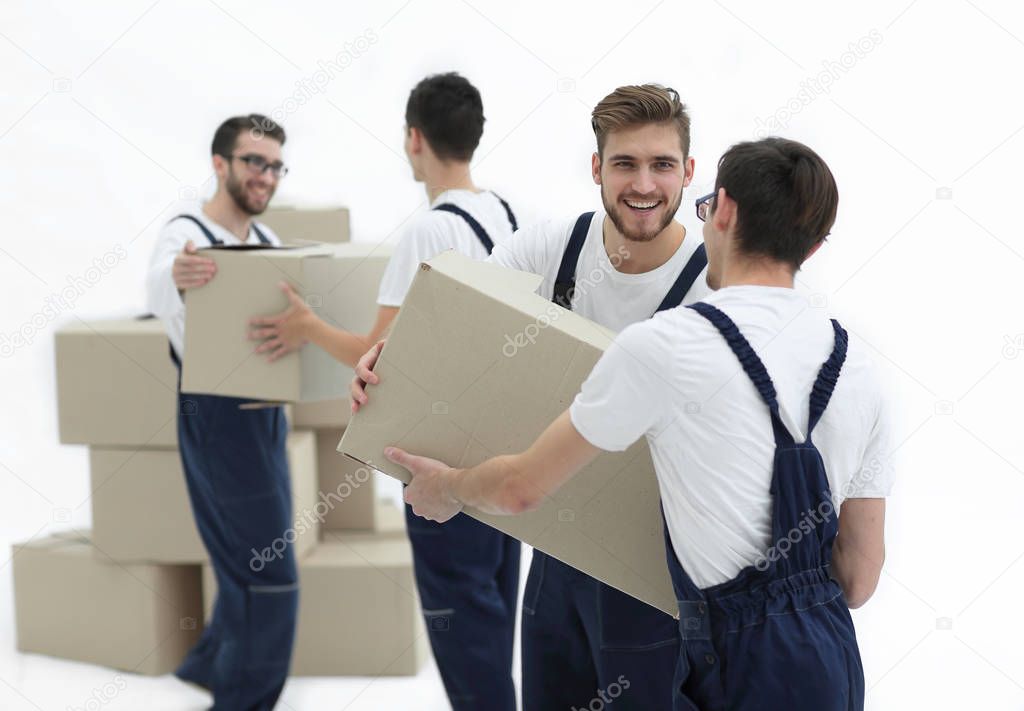 Portrait of movers holding box smiling isolated on white backgro