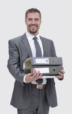 klasörler belgeleri ile bir sürü tutan işadamı gülümseyen