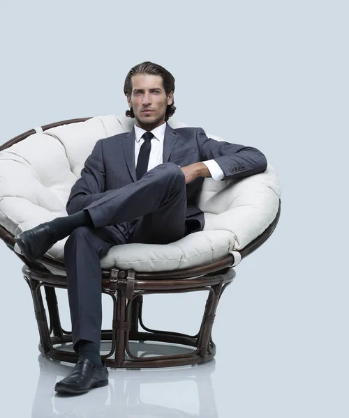 Successful businessman sitting in chair. — Stock Photo, Image