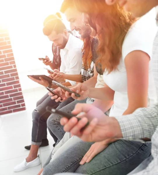 Business team using a mobile device — Stock Photo, Image