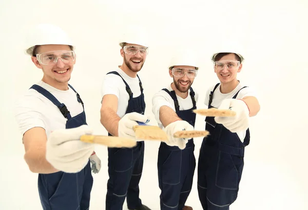 Grupo de trabalhadores da construção .isolated no branco — Fotografia de Stock