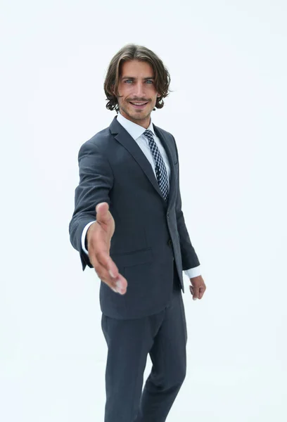Smiling friendly businessman offers a handshake — Stock Photo, Image
