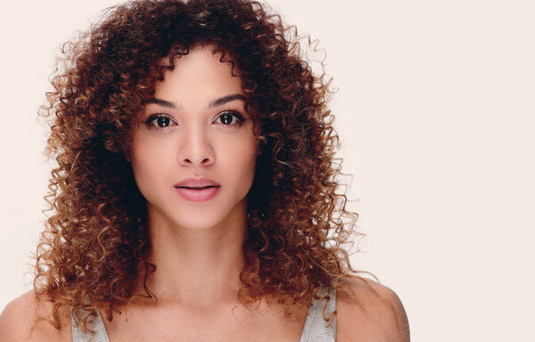 young woman with wavy hair and with day make-up