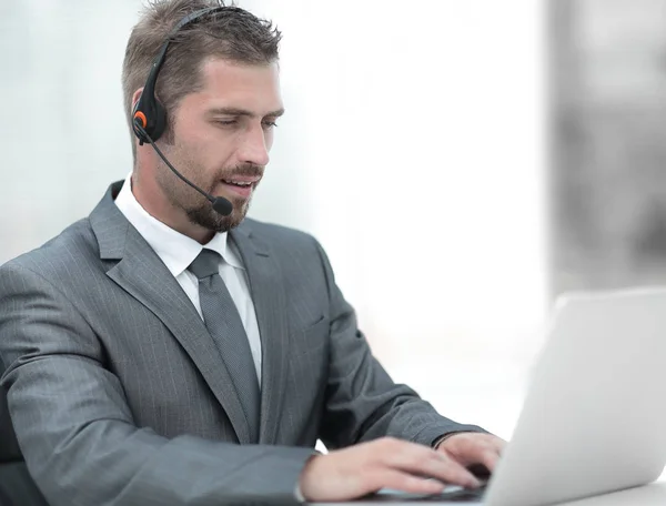 Young agent of the call center with the headphones. — Stock Photo, Image