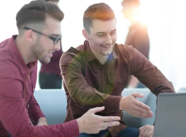 Two men working on laptop in the office. — Stock Photo, Image