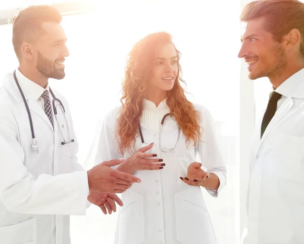 Closeup of a group of doctors discussing — Stock Photo, Image