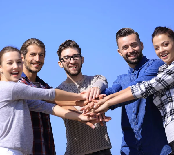 Team of young people shows their unity. — Stock Photo, Image