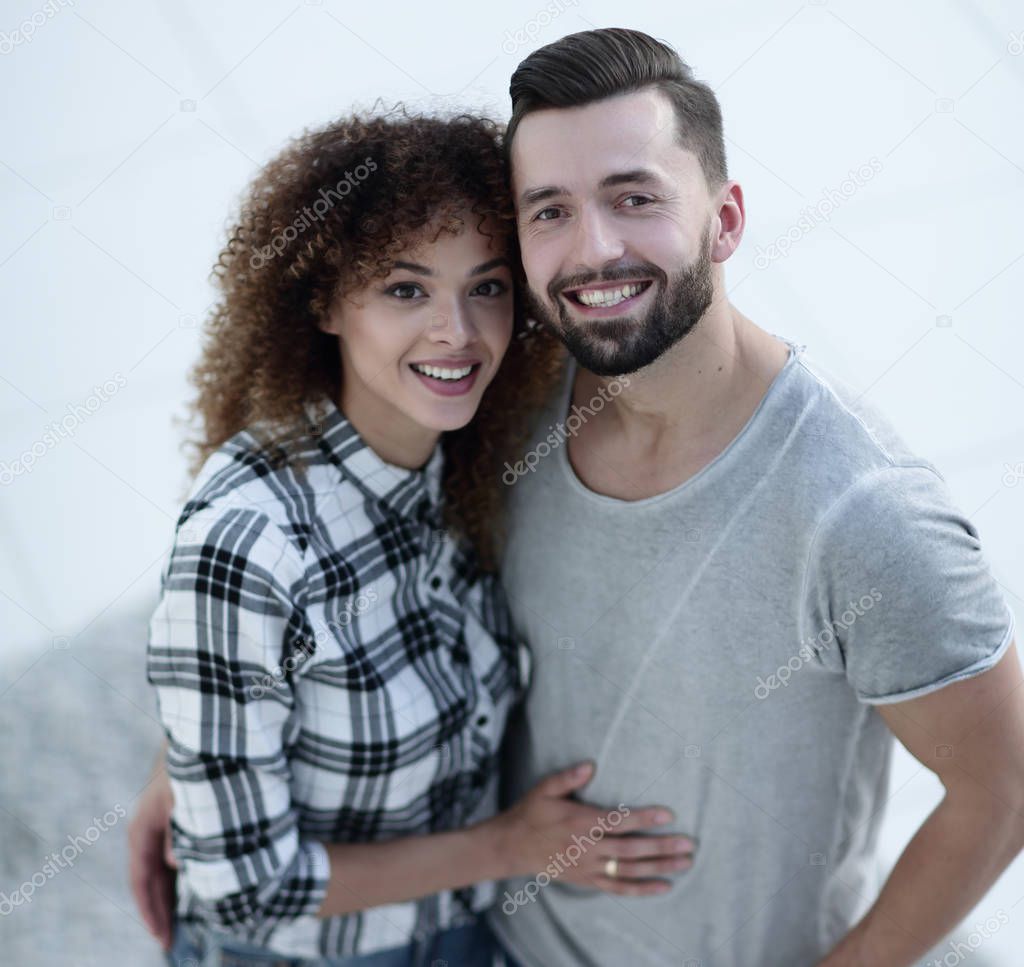 Top view modern young couple standing in new living room
