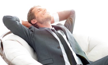 genç işadamı büyük rahat koltukta, meditasyon