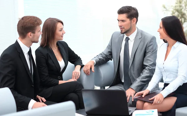 Business team sitting in the lobby of the office — Stock Photo, Image