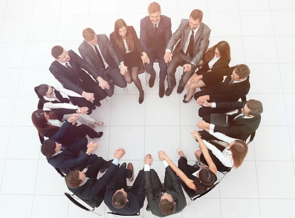 Concept of team building.large business team sitting in a circle — Stock Photo, Image