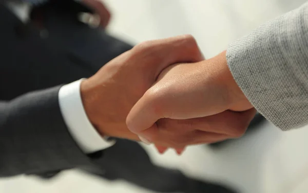 Excited smiling businessman handshaking partner at meeting, — Stock Photo, Image