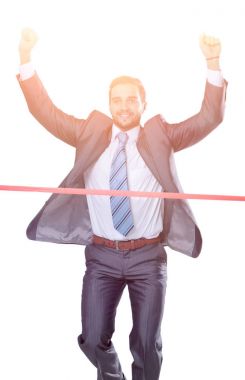 triumphant businessman in front of the starting tape clipart