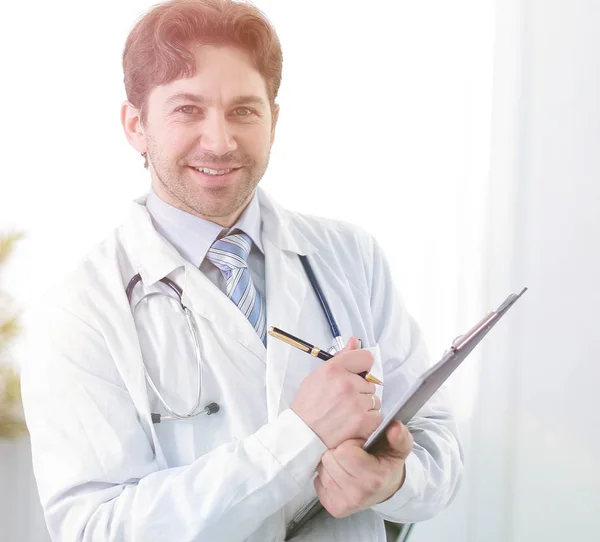 Confident therapist with documents on a light background. — Stock Photo, Image