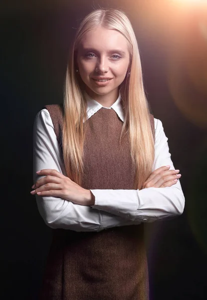 Portrait of a confident young business woman. isolated on a dark — Stock Photo, Image