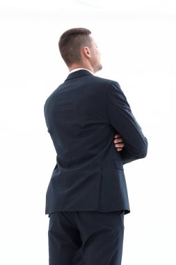 Geri bakış. Çantası olan kendine güvenen bir iş adamı.