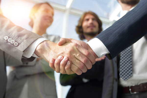 welcome and handshake business people