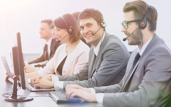 Employee call center with headset at workplace — Stock Photo, Image