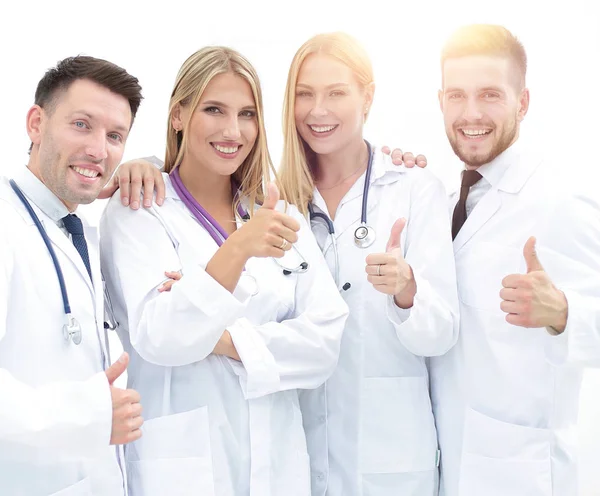 Профессиональная медицинская команда показывает большой палец вверх — стоковое фото