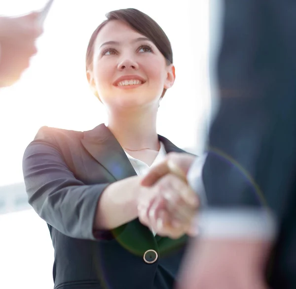 Closeup of business woman shaking hands with her business partner. — Stock Photo, Image