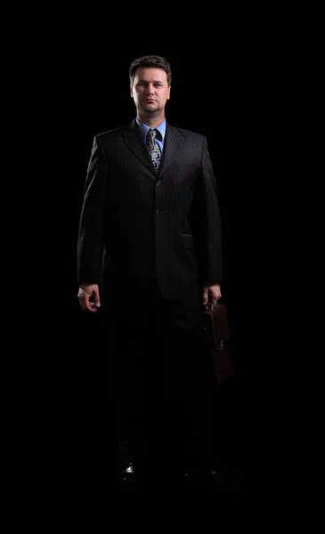 In full growth.confident businessman with briefcase — Stock Photo, Image