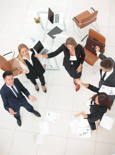 View from the top.business team throwing work documents.t — Stock Photo, Image