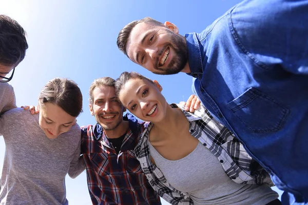 Bottom view.team of friends looking at the camera. — Stock Photo, Image