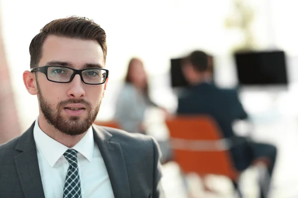 Closeup.Executive businessman on background of office. — Stock Photo, Image