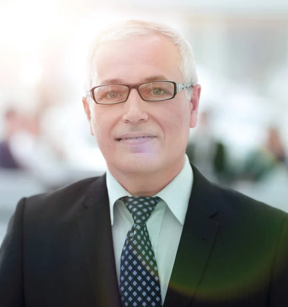 Close up portrait of senior businessman in office — Stock Photo, Image