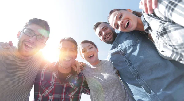 Bottom view.team of friends looking at the camera. — Stock Photo, Image