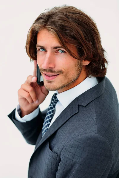 genç adam beyaz zemin üzerinde bir telefon dinleme