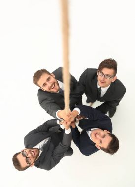 gülümseyen iş ekibi ipi tutarak