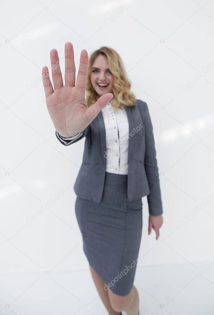 young business woman in gray suit showing five fingers.