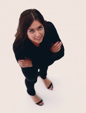 Yukarıdan görüntüleyin. Kameraya bakarak gülümseyen iş kadını.