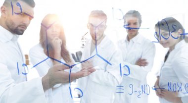 bir grup laboratuvar çalışanı.